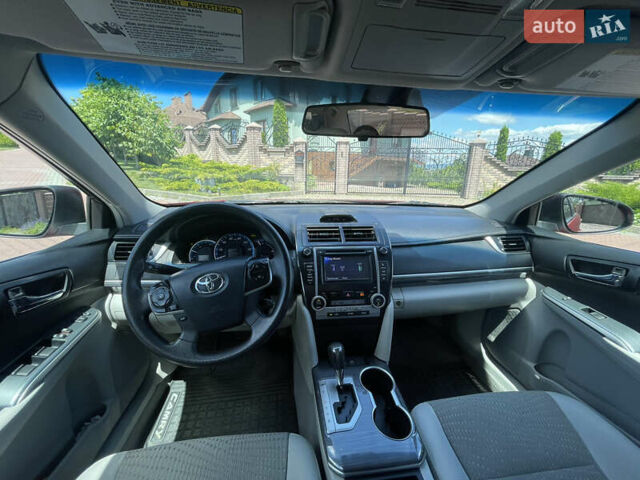 Червоний Тойота Камрі, об'ємом двигуна 2.49 л та пробігом 243 тис. км за 13200 $, фото 11 на Automoto.ua