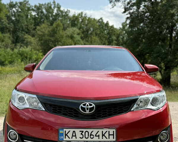 Красный Тойота Камри, объемом двигателя 2.49 л и пробегом 161 тыс. км за 13500 $, фото 2 на Automoto.ua