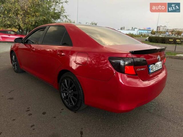 Тойота Камри 2013 в Кривом Роге на Automoto.ua Красный Тойота Камри, объемом двигателя 2.5 л и пробегом 177 тыс. км за 10700 $, фото 24 на Automoto.ua