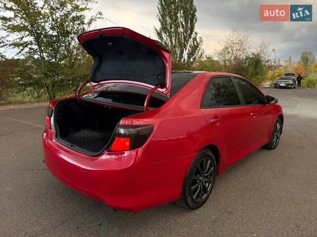 Тойота Камри 2013 в Кривом Роге на Automoto.ua Красный Тойота Камри, объемом двигателя 2.5 л и пробегом 177 тыс. км за 10700 $, фото 25 на Automoto.ua