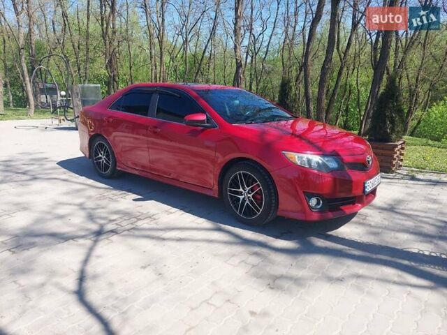 Красный Тойота Камри, объемом двигателя 2.5 л и пробегом 180 тыс. км за 12000 $, фото 16 на Automoto.ua