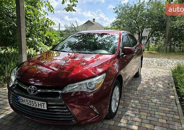 Красный Тойота Камри, объемом двигателя 2.5 л и пробегом 47 тыс. км за 15000 $, фото 21 на Automoto.ua