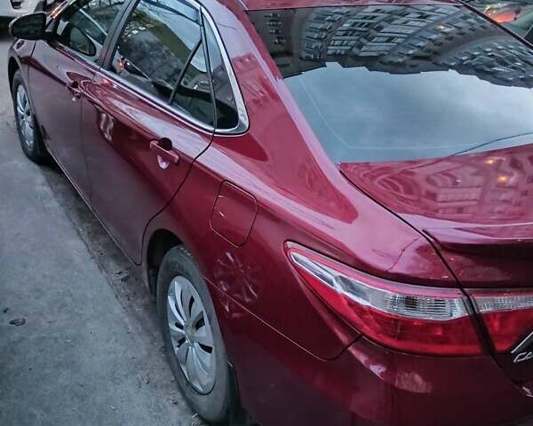 Красный Тойота Камри, объемом двигателя 2.49 л и пробегом 162 тыс. км за 11700 $, фото 3 на Automoto.ua