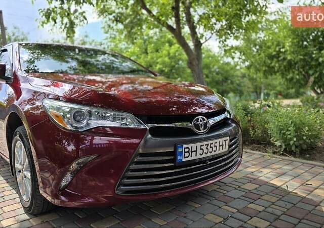 Красный Тойота Камри, объемом двигателя 2.5 л и пробегом 47 тыс. км за 15000 $, фото 22 на Automoto.ua