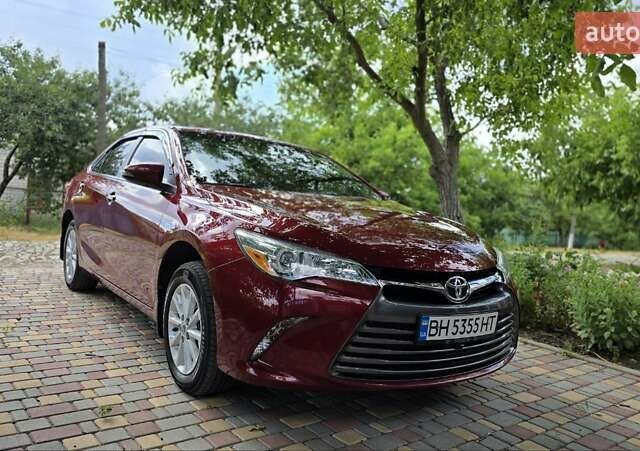Красный Тойота Камри, объемом двигателя 2.5 л и пробегом 47 тыс. км за 15000 $, фото 17 на Automoto.ua