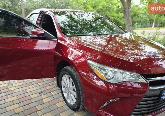 Красный Тойота Камри, объемом двигателя 2.5 л и пробегом 47 тыс. км за 15000 $, фото 3 на Automoto.ua