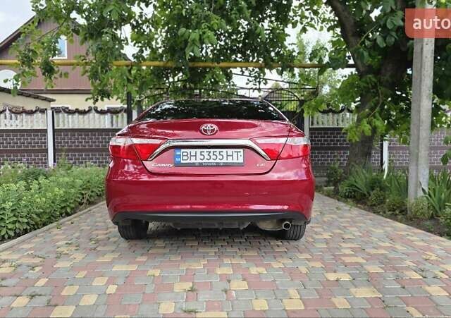 Красный Тойота Камри, объемом двигателя 2.5 л и пробегом 47 тыс. км за 15000 $, фото 9 на Automoto.ua