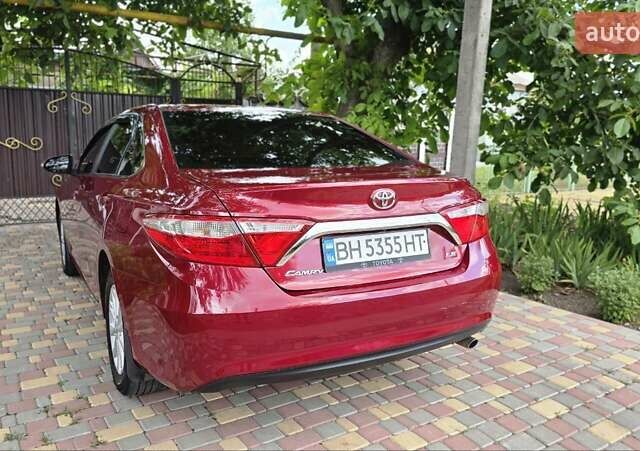 Красный Тойота Камри, объемом двигателя 2.5 л и пробегом 47 тыс. км за 15000 $, фото 11 на Automoto.ua