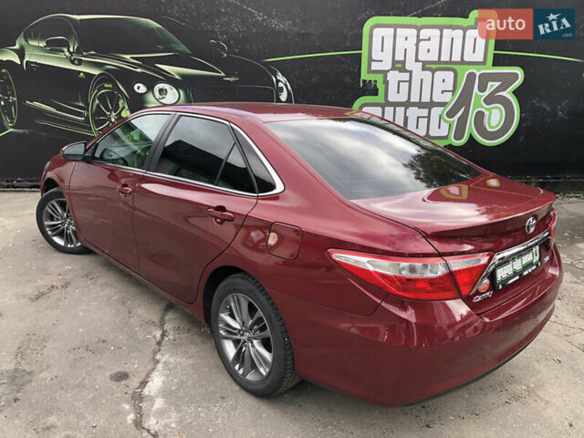 Красный Тойота Камри, объемом двигателя 2.49 л и пробегом 118 тыс. км за 12700 $, фото 7 на Automoto.ua