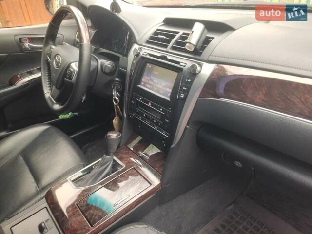 Красный Тойота Камри, объемом двигателя 2.49 л и пробегом 181 тыс. км за 14700 $, фото 51 на Automoto.ua