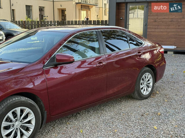 Красный Тойота Камри, объемом двигателя 2.49 л и пробегом 185 тыс. км за 11700 $, фото 5 на Automoto.ua