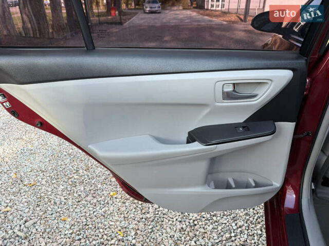 Красный Тойота Камри, объемом двигателя 2.49 л и пробегом 185 тыс. км за 11700 $, фото 40 на Automoto.ua