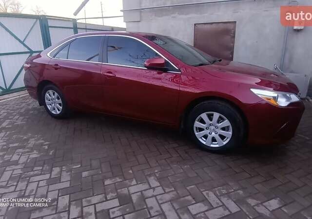 Червоний Тойота Камрі, об'ємом двигуна 2.49 л та пробігом 207 тис. км за 13000 $, фото 7 на Automoto.ua