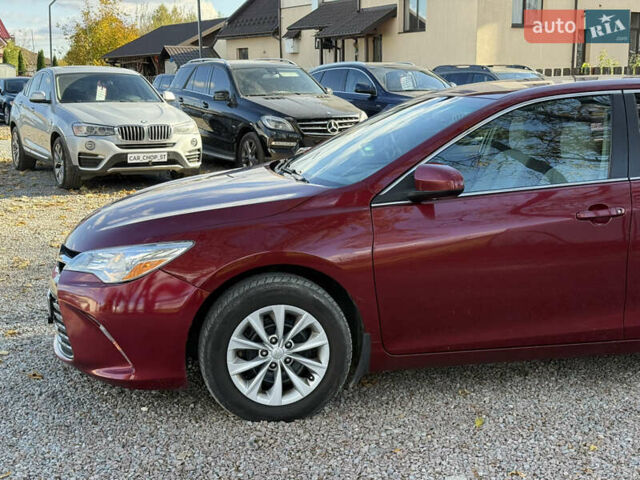 Красный Тойота Камри, объемом двигателя 2.49 л и пробегом 185 тыс. км за 11700 $, фото 6 на Automoto.ua