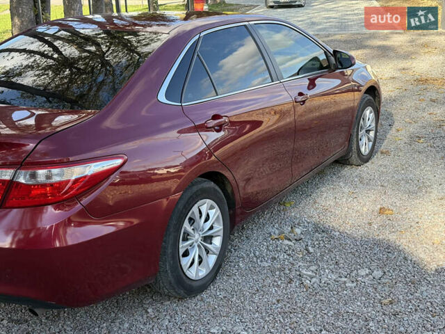 Красный Тойота Камри, объемом двигателя 2.49 л и пробегом 185 тыс. км за 11700 $, фото 13 на Automoto.ua