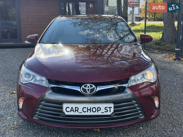Красный Тойота Камри, объемом двигателя 2.49 л и пробегом 185 тыс. км за 11700 $, фото 21 на Automoto.ua