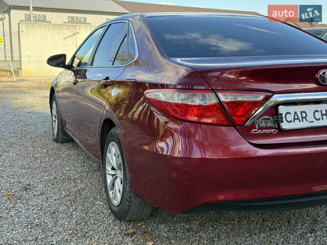 Красный Тойота Камри, объемом двигателя 2.49 л и пробегом 185 тыс. км за 11700 $, фото 10 на Automoto.ua