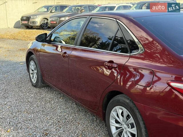 Красный Тойота Камри, объемом двигателя 2.49 л и пробегом 185 тыс. км за 11700 $, фото 8 на Automoto.ua
