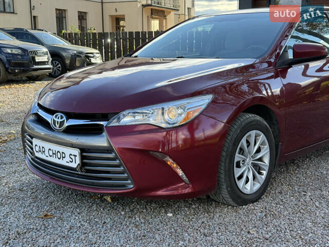 Красный Тойота Камри, объемом двигателя 2.49 л и пробегом 185 тыс. км за 11700 $, фото 2 на Automoto.ua