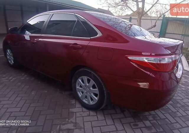 Червоний Тойота Камрі, об'ємом двигуна 2.49 л та пробігом 207 тис. км за 13000 $, фото 9 на Automoto.ua