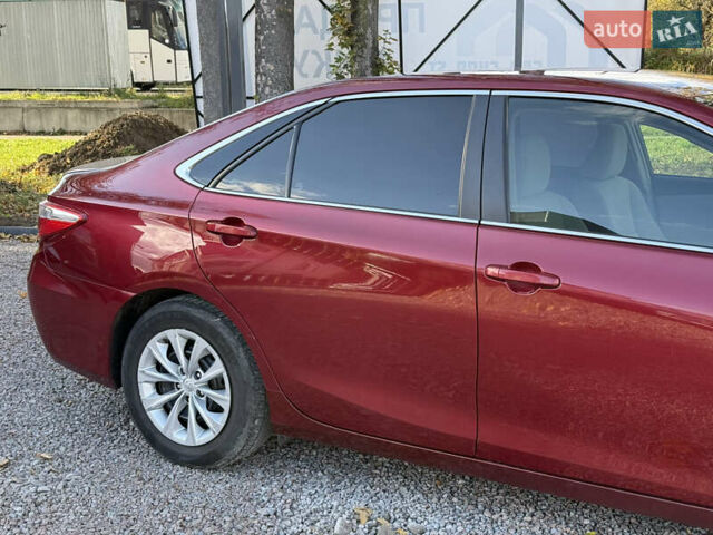 Красный Тойота Камри, объемом двигателя 2.49 л и пробегом 185 тыс. км за 11700 $, фото 16 на Automoto.ua