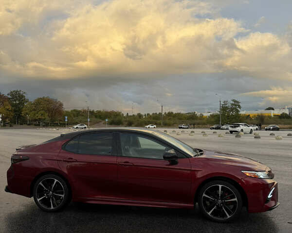 Красный Тойота Камри, объемом двигателя 2.49 л и пробегом 119 тыс. км за 23500 $, фото 1 на Automoto.ua