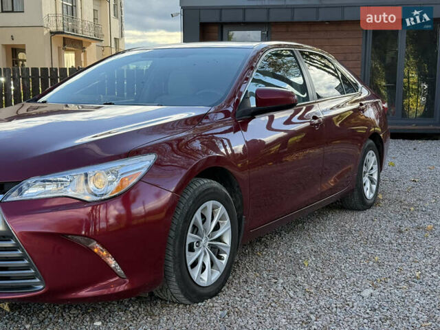 Красный Тойота Камри, объемом двигателя 2.49 л и пробегом 185 тыс. км за 11700 $, фото 3 на Automoto.ua