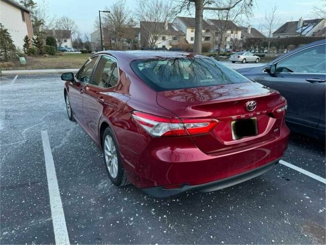 Красный Тойота Камри, объемом двигателя 2.5 л и пробегом 49 тыс. км за 5600 $, фото 1 на Automoto.ua