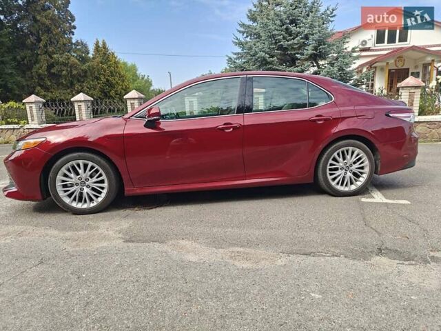 Красный Тойота Камри, объемом двигателя 2.49 л и пробегом 136 тыс. км за 24000 $, фото 9 на Automoto.ua