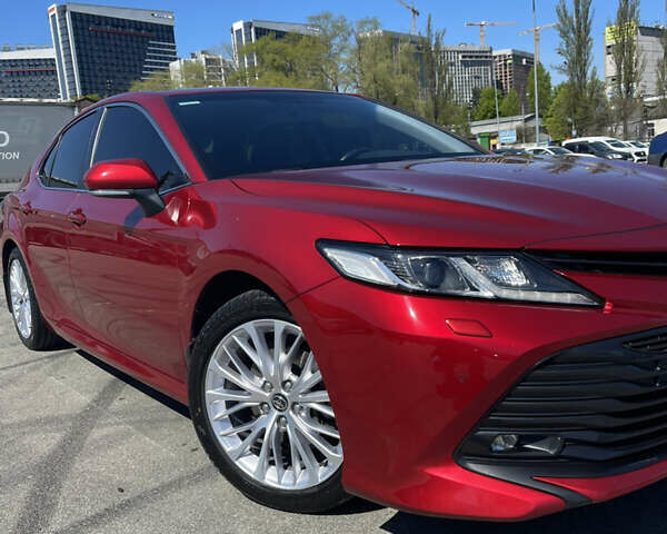 Красный Тойота Камри, объемом двигателя 2.49 л и пробегом 77 тыс. км за 23700 $, фото 1 на Automoto.ua