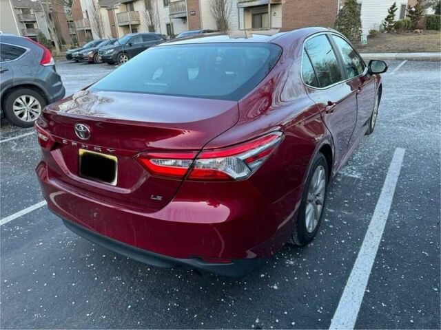 Красный Тойота Камри, объемом двигателя 2.5 л и пробегом 49 тыс. км за 5600 $, фото 2 на Automoto.ua