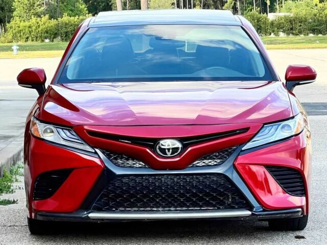 Красный Тойота Камри, объемом двигателя 2.5 л и пробегом 50 тыс. км за 9500 $, фото 1 на Automoto.ua