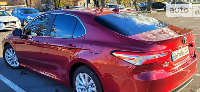 Красный Тойота Камри, объемом двигателя 2.49 л и пробегом 70 тыс. км за 22700 $, фото 1 на Automoto.ua