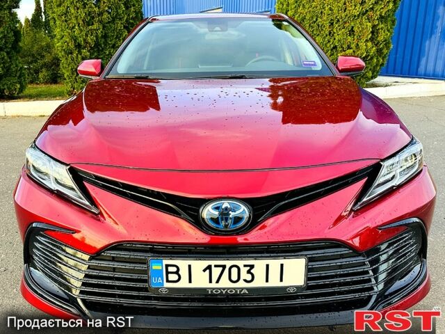 Красный Тойота Камри, объемом двигателя 2.5 л и пробегом 57 тыс. км за 30500 $, фото 1 на Automoto.ua