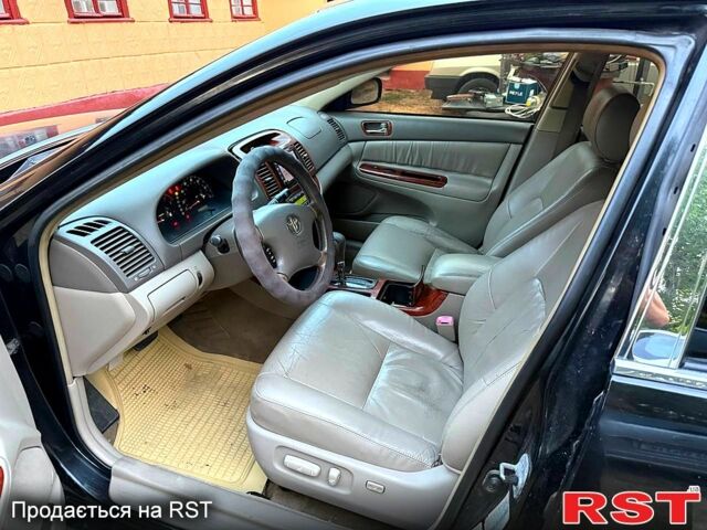 Тойота Камри, объемом двигателя 3 л и пробегом 290 тыс. км за 4300 $, фото 7 на Automoto.ua