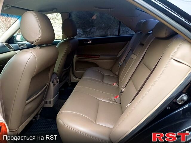 Тойота Камри, объемом двигателя 2.4 л и пробегом 250 тыс. км за 5500 $, фото 9 на Automoto.ua