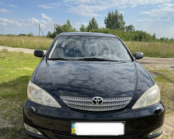 Тойота Камри, объемом двигателя 2.4 л и пробегом 280 тыс. км за 7800 $, фото 4 на Automoto.ua