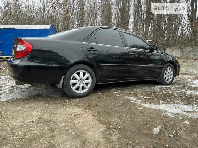 Тойота Камри, объемом двигателя 3 л и пробегом 234 тыс. км за 6100 $, фото 6 на Automoto.ua