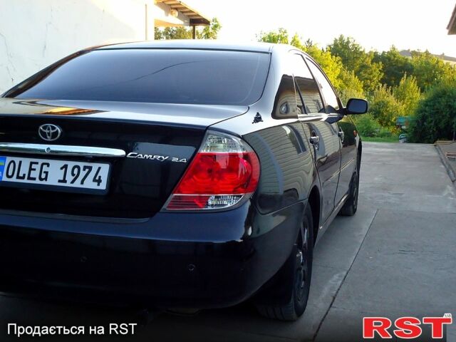 Тойота Камри, объемом двигателя 2.4 л и пробегом 300 тыс. км за 7500 $, фото 4 на Automoto.ua