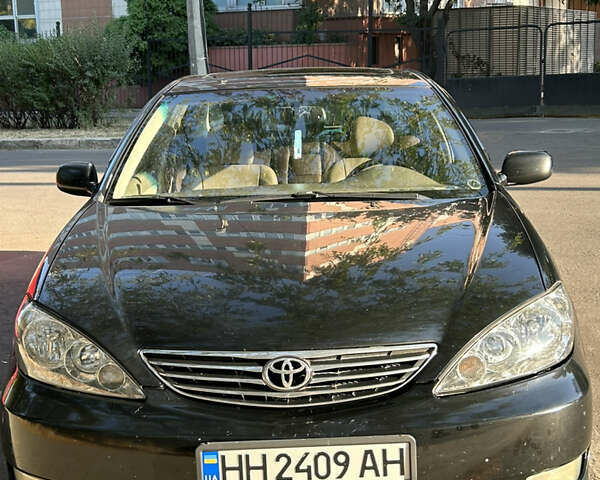 Тойота Камри, объемом двигателя 2.4 л и пробегом 260 тыс. км за 6000 $, фото 7 на Automoto.ua