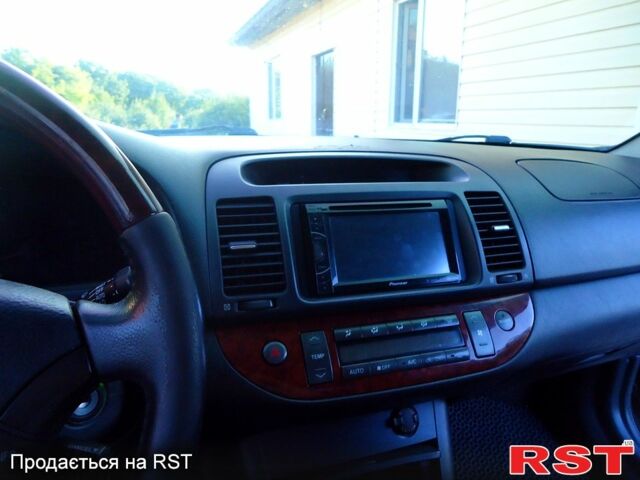 Тойота Камри, объемом двигателя 2.4 л и пробегом 300 тыс. км за 7500 $, фото 2 на Automoto.ua