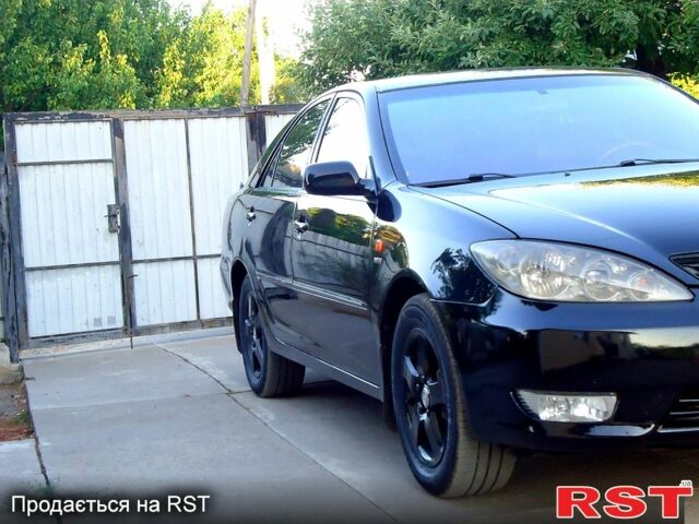 Тойота Камри, объемом двигателя 2.4 л и пробегом 300 тыс. км за 7500 $, фото 1 на Automoto.ua