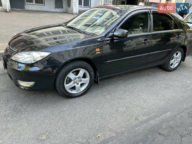 Тойота Камри, объемом двигателя 2.4 л и пробегом 260 тыс. км за 6000 $, фото 9 на Automoto.ua