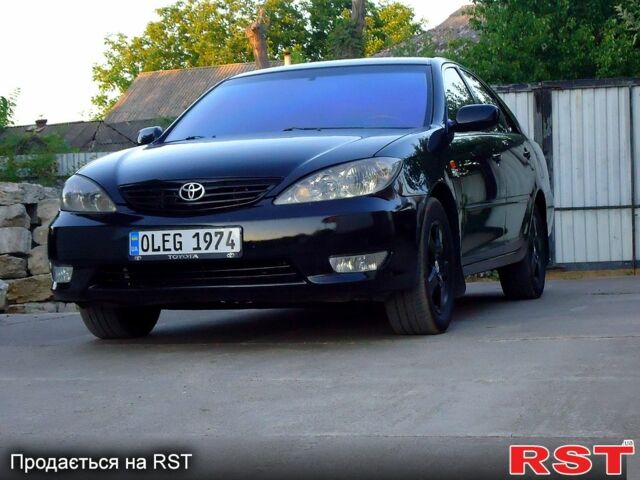 Тойота Камри, объемом двигателя 2.4 л и пробегом 300 тыс. км за 7500 $, фото 5 на Automoto.ua