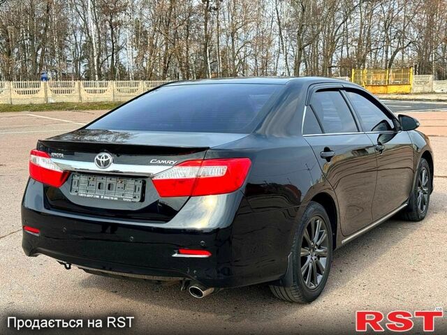 Тойота Камри, объемом двигателя 2.5 л и пробегом 168 тыс. км за 14150 $, фото 4 на Automoto.ua