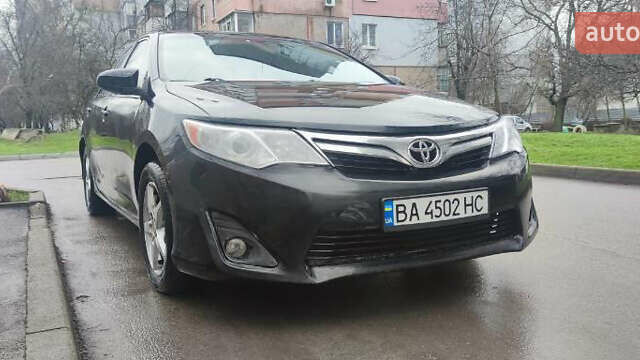 Тойота Камри, объемом двигателя 2.49 л и пробегом 289 тыс. км за 7999 $, фото 2 на Automoto.ua