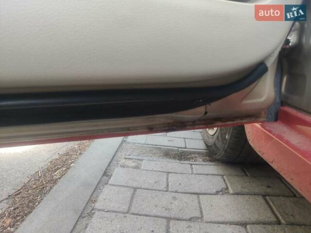 Желтый Тойота Камри, объемом двигателя 2.4 л и пробегом 373 тыс. км за 7000 $, фото 13 на Automoto.ua