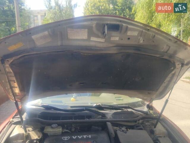 Желтый Тойота Камри, объемом двигателя 2.4 л и пробегом 373 тыс. км за 7000 $, фото 8 на Automoto.ua
