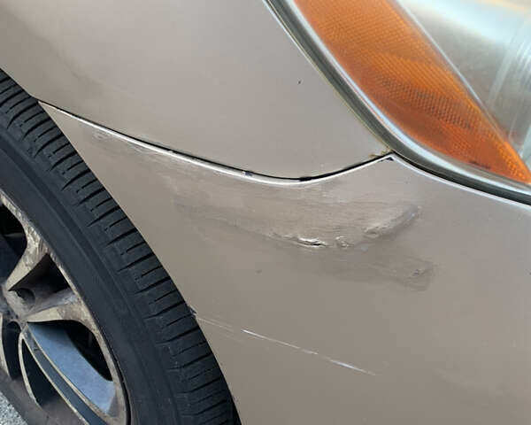 Желтый Тойота Камри, объемом двигателя 2.36 л и пробегом 190 тыс. км за 7900 $, фото 24 на Automoto.ua