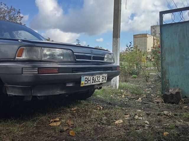 Серый Тойота Камри, объемом двигателя 1.8 л и пробегом 100 тыс. км за 360 $, фото 1 на Automoto.ua